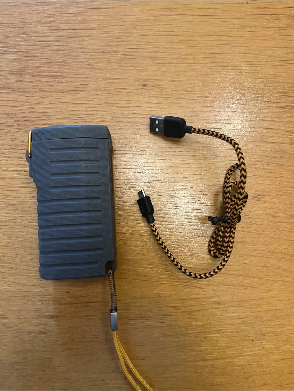 Unbranded Gray Power Bank with Yellow Accents and Braided USB Cable